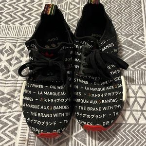 Adidas NMD R1 Berlin Edition Boost BLN Black sneakers.